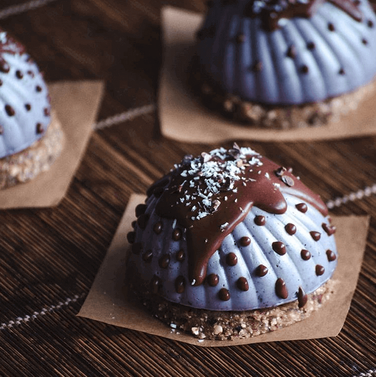 Small cakes with chocolate topping